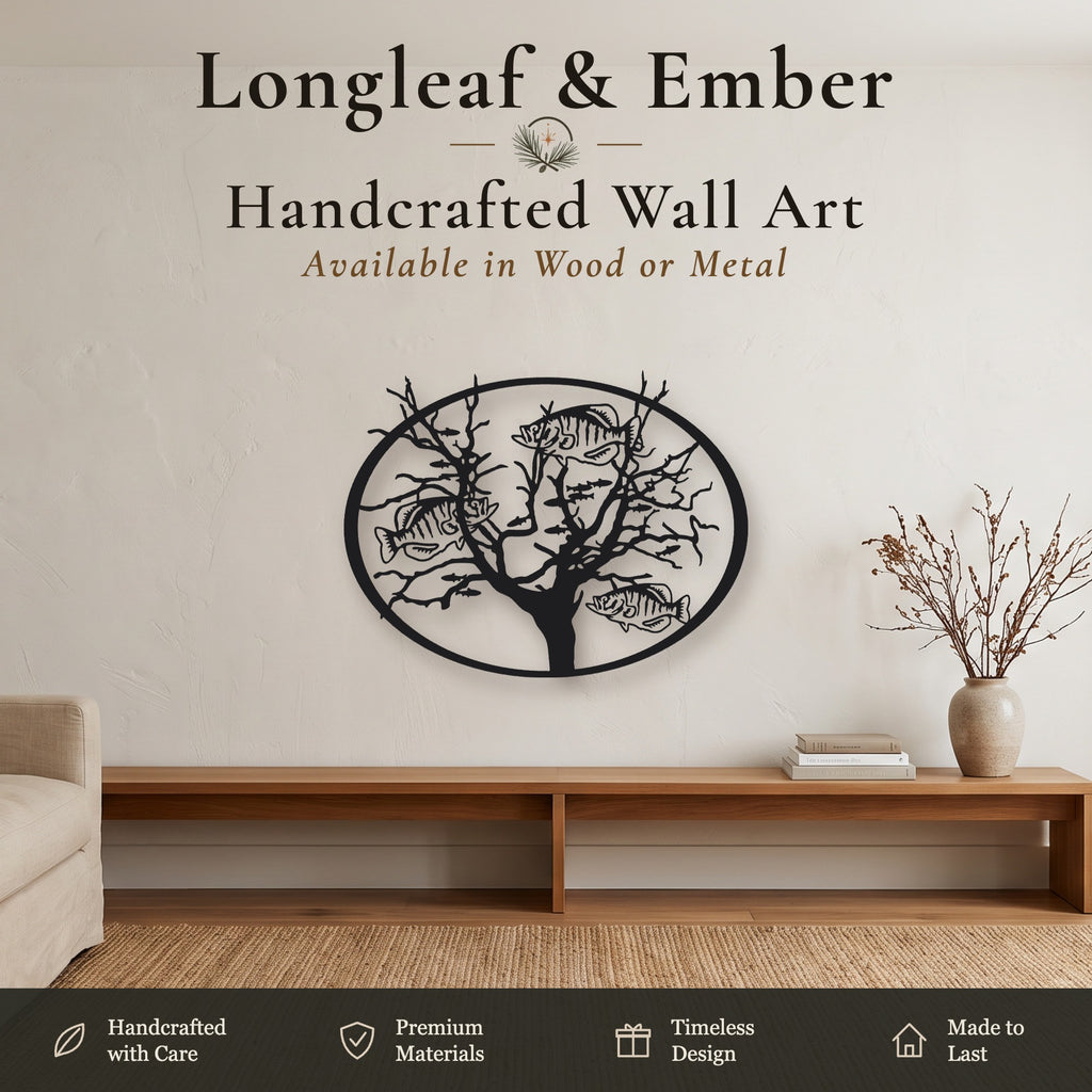 Black metal Tree of Life wall art with fish design
