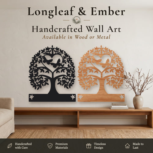 Two personalized Tree of Life wall art pieces with butterfly heart design and name plate, one in black metal and one in stained wood