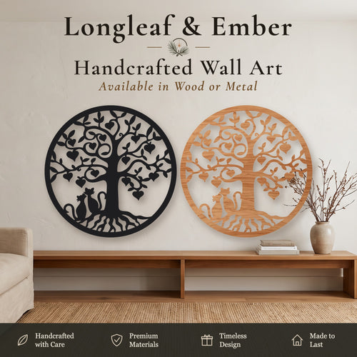 Two round Tree of Life wall art pieces with two cats and heart-shaped leaves, one in black metal and one in stained wood
