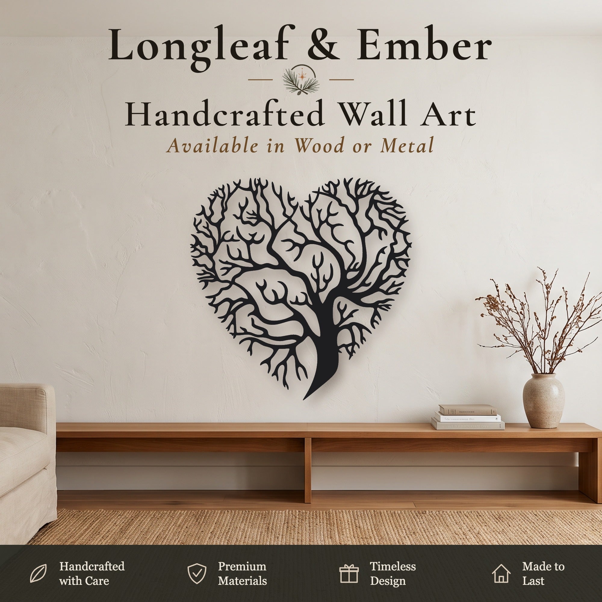 Black heart-shaped metal wall art featuring a detailed tree design, displayed on a beige wall in a modern living room setting above a wooden console table.